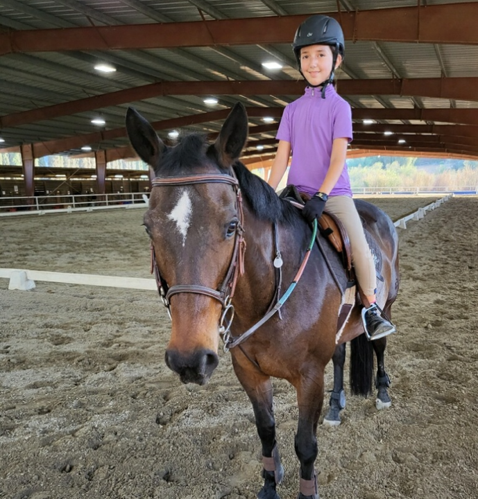 Girl on Horse at Riding Lessons - Bridges Equestrian
